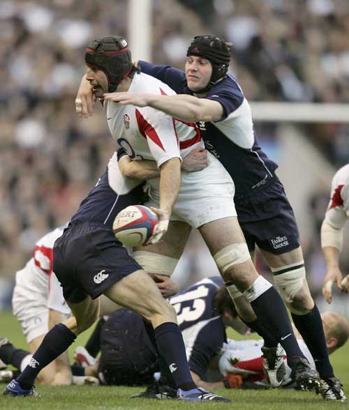 England's Danny Grewcock looks for support against Scotland