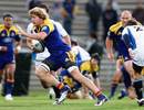 Highlanders flanker Adam Thomson takes on the Cheetahs defence