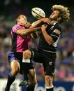 Francois Steyn of the Sharks looks to gather a high ball