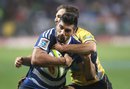 Damian de Allende of the Stormers takes on the Brumbies defence
