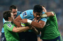 The Waratahs' Will Skelton takes the ball into contact