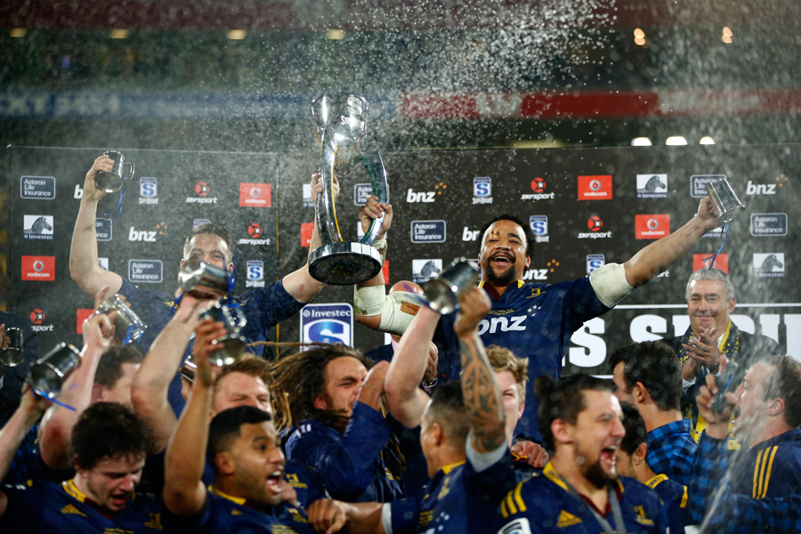 The Highlanders' Ben Smith and Nasi Manu lift the trophy