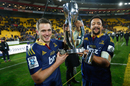 The Highlanders' Ben Smith and Nasi Manu show off the silverware