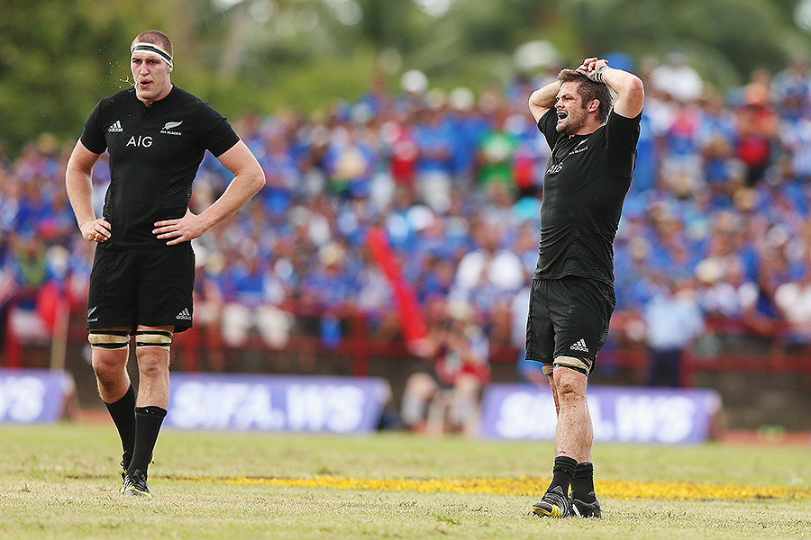 New Zealand's Brodie Retallick (L) and Richie McCaw take in a breather