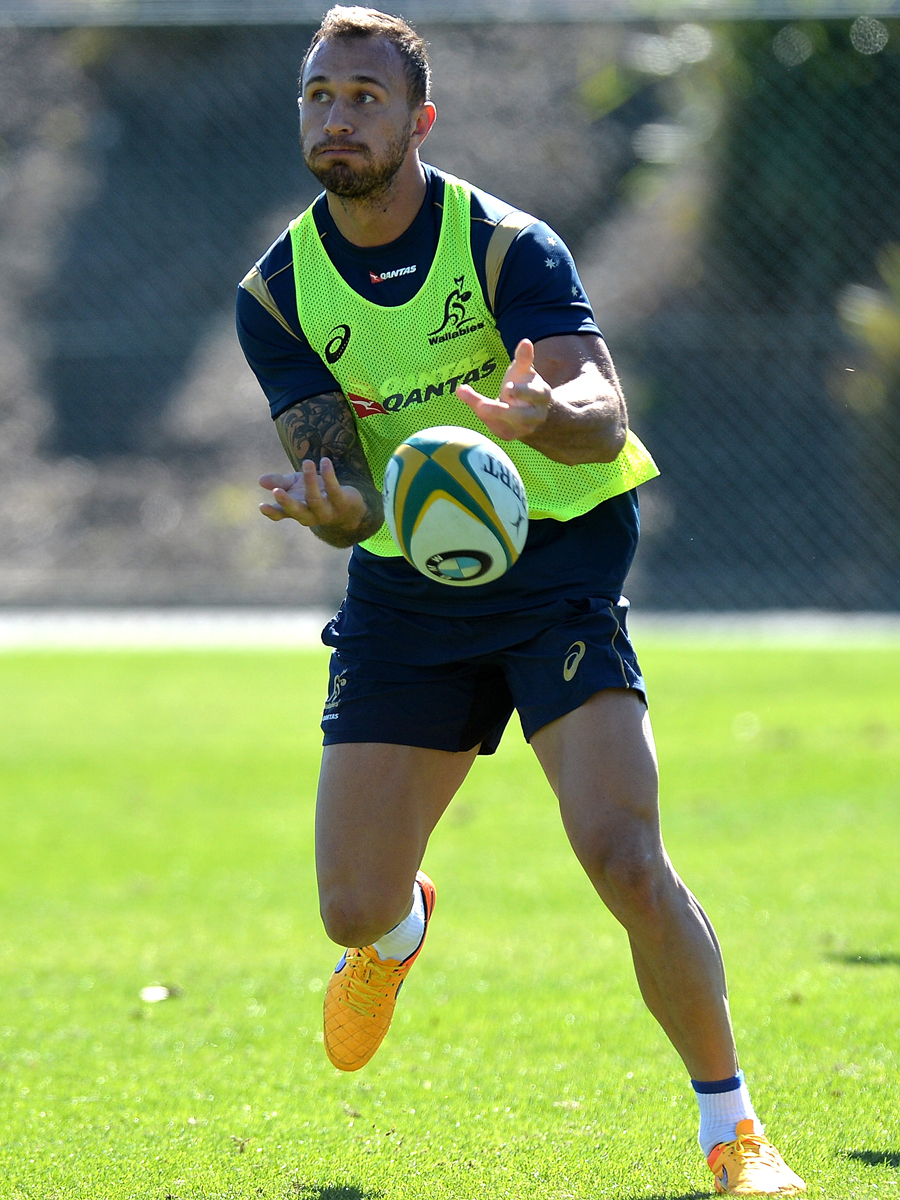Australia's Quade Cooper passses the ball during a Wallabies training session