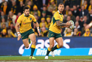 Australia's Quade Cooper attacks the line, Australia v South Africa, Brisbane, Australia, July 18, 2015