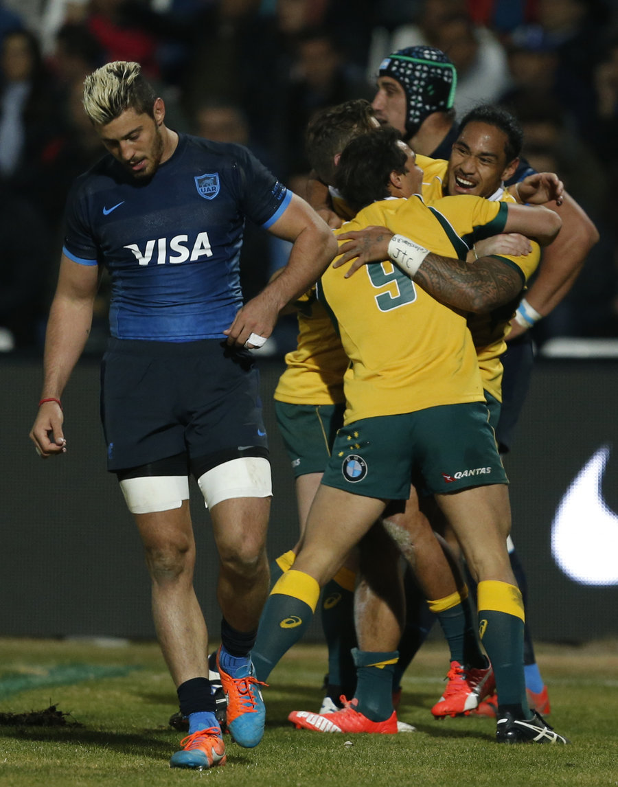 Nick Phipps and Joe Tomane of the Wallabies celebrate a try