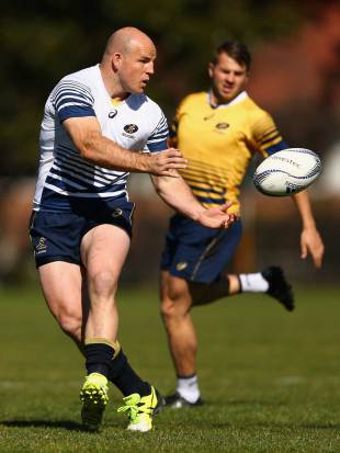 Australia's Stephen Moore passes the ball during a Wallabies training session, Tramway Oval, Sydney, August 11, 2015