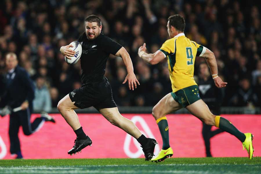 New Zealand's Dane Coles outsprints Nick White to score a try