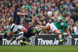 DUBLIN, IRELAND - AUGUST 15:  Simon Zebo of Ireland is tackled by Sean Lamont of Scotland during the International match between Ireland and Scotland at the Aviva Stadium on August 15, 2015 in Dublin, Ireland.  (Photo by Michael Steele/Getty Images)