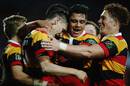 Waikato's Shaun Stevenson celebrates with Anton Lienert-Brown and Declan ODonnell after scoring a try