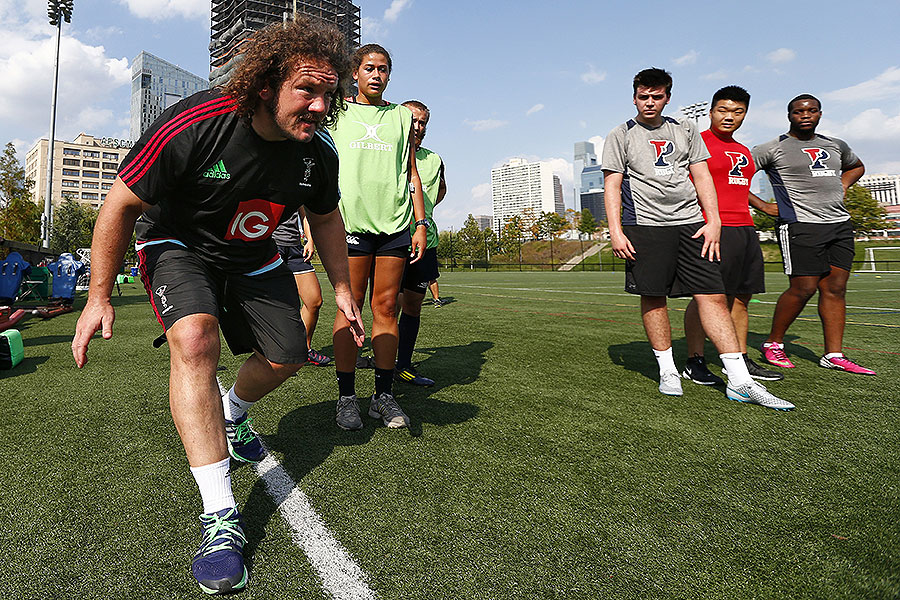 Harlequins prop Adam Jones demonstrates a drill at a coaching clinic in Philadelphia