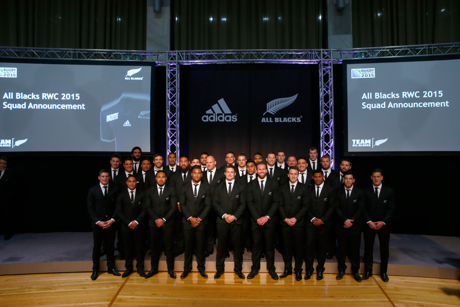 The All Black 2015 Rugby World Cup team pose on stage