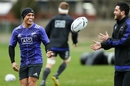 Aaron Smith passes to Nehe Milner-Skudder during a New Zealand All Blacks training session