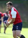 England's Brad Barritt shapes to pass during training