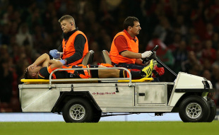 CARDIFF, WALES - SEPTEMBER 05:  Rhys Webb of Wales is stretchered off the field after suffering a leg injury during the International Match between Wales and Italy at Millennium Stadium on September 5, 2015 in Cardiff, Wales.  (Photo by Dan Mullan/Getty Images)