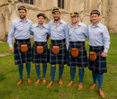 Members of the Scotland team pose with their World Cup caps after the RWC 2015 Welcome Ceremony