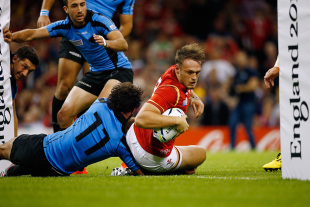 Cory Allen of Wales goes over to score his teams second try during the 2015 Rugby World Cup Pool A match between Wales and Uruguay at the Millennium Stadium on September 20, 2015 in Cardiff, United Kingdom.  (Photo by Stu Forster/Getty Images)