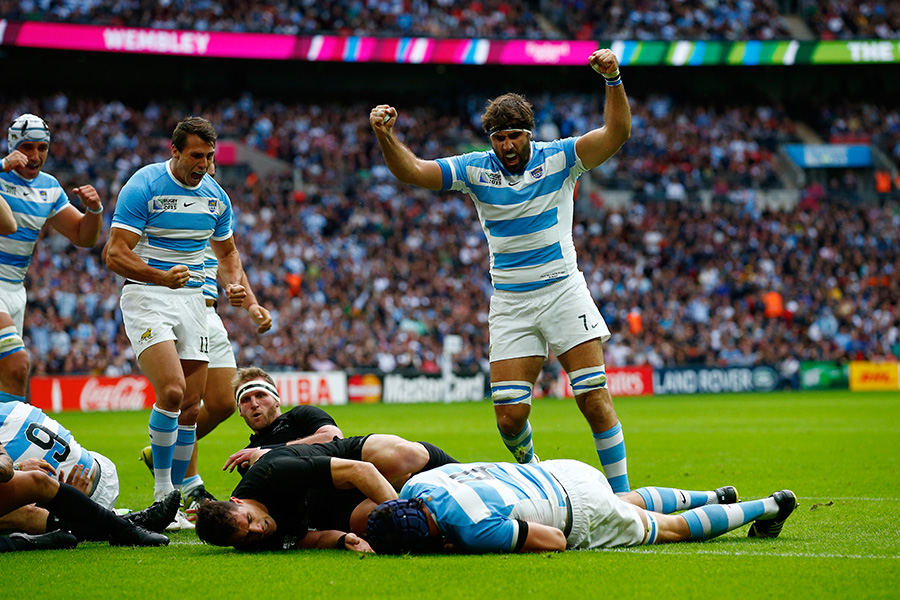 Juan Martin Fernandez Lobbe of Argentina celebrates as Guido Petti Pagadizabal goes over to score their first try