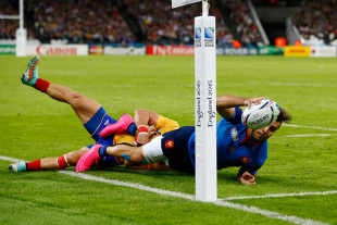 LONDON, ENGLAND - SEPTEMBER 23:  Sofiane Guitoune of France scores his teams opening try during the 2015 Rugby World Cup Pool D match between France and Romania at the Olympic Stadium on September 23, 2015 in London, United Kingdom.  (Photo by Chris Lee - World Rugby/World Rugby via Getty Images)