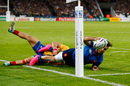 Sofiane Guitoune of France scores his team's opening try 