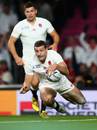England's Jonny May scores a try
