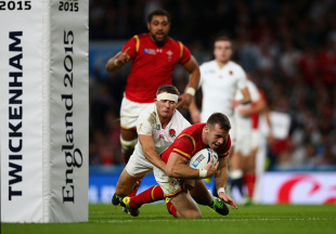 LONDON, ENGLAND - SEPTEMBER 26:  Gareth Davies of Wales goes over to score a try during the 2015 Rugby World Cup Pool A match between England and Wales at Twickenham Stadium on September 26, 2015 in London, United Kingdom.  (Photo by Paul Gilham/Getty Images)