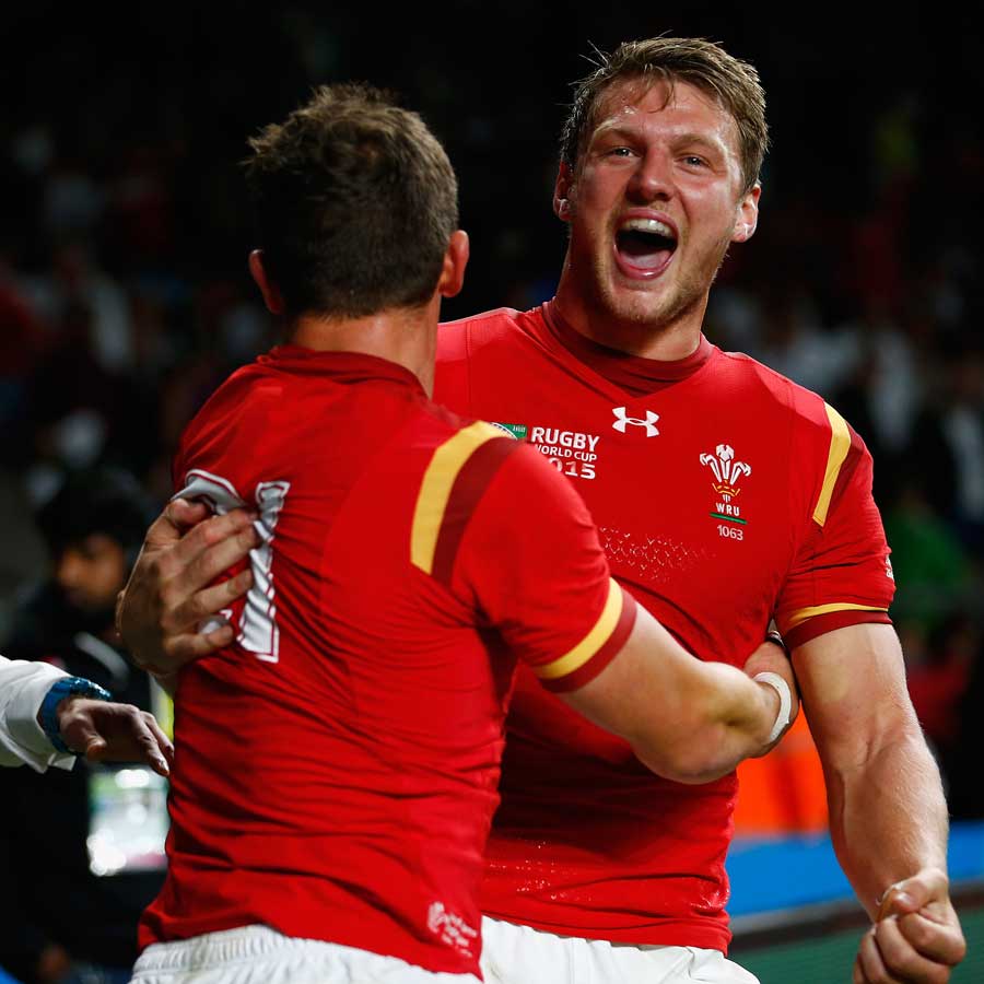 Wales' Dan Biggar and Lloyd Williams celebrate victory
