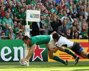 LONDON, ENGLAND - SEPTEMBER 27: Tommy Bowe of Ireland scores a try during the 2015 Rugby World Cup Pool D match between Ireland and Romania at Wembley Stadium, on September 27, 2015 in London, United Kingdom. (Photo by Mitchell Gunn/Getty Images)