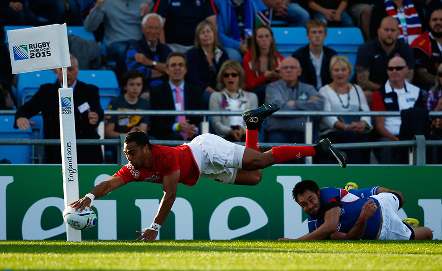 Telusa Veainu of Tonga narrowly fails to ground the ball before putting his hand in touch