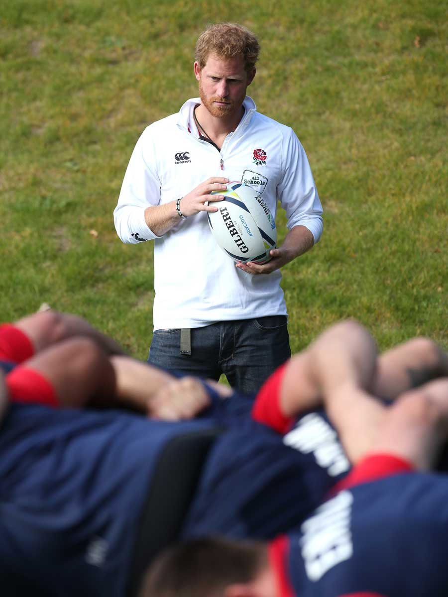 Prince Harry watches England practise their scrummaging