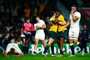 LONDON, ENGLAND - OCTOBER 03:  Chris Robshaw and Tom Wood (R) of England react as Bernard Foley of Australia celebrates scoring their first try with Tevita Kuridrani of Australia during the 2015 Rugby World Cup Pool A match between England and Australia at Twickenham Stadium on October 3, 2015 in London, United Kingdom.  (Photo by Mike Hewitt/Getty Images)