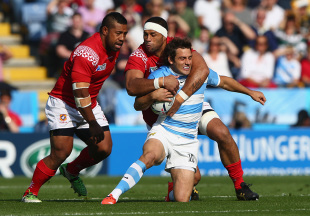 LEICESTER, ENGLAND - OCTOBER 04:  Nicolas Sanchez (R) of Argentina is tackled high by Tukulua Lokotui (C) of Tonga during the 2015 Rugby World Cup Pool C match between Argentina and Tonga at Leicester City Stadium on October 4, 2015 in Leicester, United Kingdom.  (Photo by Michael Steele/Getty Images)