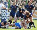 Italy's player of the Six Nations Sergio Parisse is surrounded by French defenders 