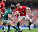 Wales' Martyn Williams looks to wrong foot Ireland's Jerry Flannery