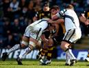 Wasps' Rob Webber is wrapped up by the Bristol defence