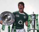 Ireland's Donncha O'Callaghan poses with the Six Nations and Triple Crown trophies