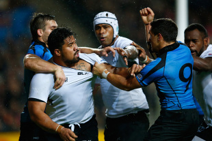 MILTON KEYNES, ENGLAND - OCTOBER 06:  Campese Ma'afu of Fiji (2L) and Agustin Ormaechea of Uruguay (9) clash after a try by  Kini Murimurivalu of Fiji during the 2015 Rugby World Cup Pool A match between Fiji and Uruguay at Stadium mk on October 6, 2015 in Milton Keynes, United Kingdom.  (Photo by Shaun Botterill/Getty Images)