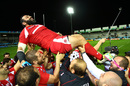 Davit Zirakashvili of Georgia is lifted by team mates after announcing his retirement after Georgia's final match of the Rugby World Cup