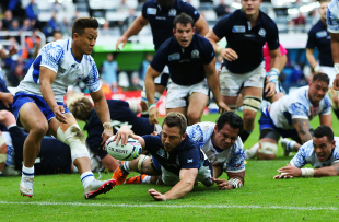 NEWCASTLE, ENGLAND - OCTOBER  10:  Greig Laidlaw of Scotland scores a try during the 2015 Rugby World Cup Pool B match between Samoa and Scotland at St James Park on October 10, 2015 in Newcastle, England. (Photo by Ian MacNicol/Getty Images)