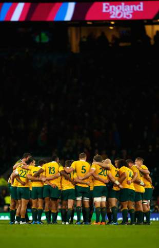 The Wallabies huddle as they celebrate victory, Australia v Wales, Rugby World Cup, Twickenham Stadium, London, October 10, 2015