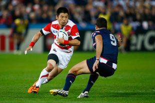 GLOUCESTER, ENGLAND - OCTOBER 11:  Fumiaki Tanaka of Japan looks to go past Mike Petri of the United States during the 2015 Rugby World Cup Pool B match between USA and Japan at Kingsholm Stadium on October 11, 2015 in Gloucester, United Kingdom.  (Photo by Julian Finney/Getty Images)