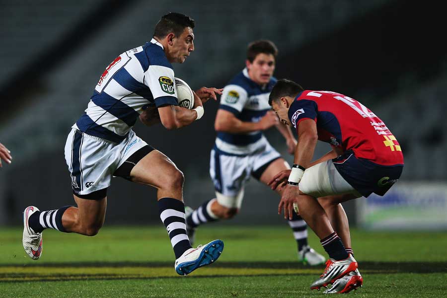 Auckland's Bryce Heem takes the ball into contact