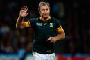 South Africa's Schalk Burger waves as he leaves his final Test