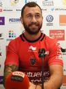 Quade Cooper smiles during his official presentation to the press as Top14 club Toulon's new recruit
