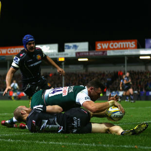 Adam Thompstone of Leicester Tigers goes over the tryline as James Short of Exeter Chiefs challenges only for the attempt to be disallowed during the Aviva Premiership match between Exeter Chiefs and Leicester Tigers at Sandy Park on November 7, 2015 in Exeter, England. (Photo by Michael Steele/Getty Images)