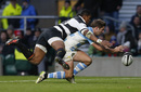 Argentina winger Santiago Cordero scores as he is tackled by Barbarians winger Waisake Naholo 