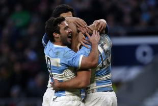 Argentinas Full Back Ramiro Moyano (R) celebrates scoring his try with Argentinas Scrum Half Martin Landajo during the International rugby union match between Argentina and the Barbarians