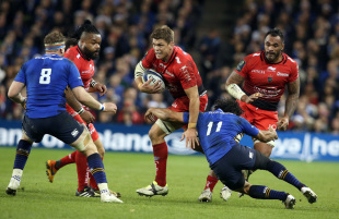 Toulon's flanker from South Africa Juan Smith (C) is tackled by Leinster's wing from New Zealand Isakeli Nacewa during the European Rugby Champions Cup rugby union match between Leinster and Toulon in Dublin on December 19, 2015.