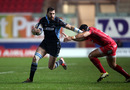 Glasgow's Sean Lamont attempts to hand off a tackle against the Scarlets.